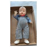 Vintage  sleepy eye. doll  with conductor clothes
