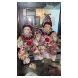 Porcelain clown baby doll figure