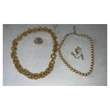 Gold tone necklaces and pins