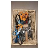 Miscellaneous scissors in a basket