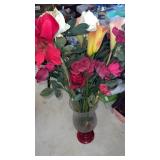 Glass vase with artificial flowers