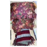 4 decorative pillows and crochet blanket