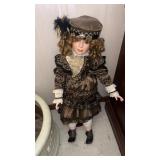28" porcelain doll on stand