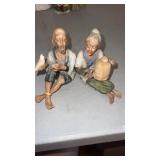 Inrco  sitting Asian old man and old woman