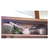 Shelf of kitchen dishes/ containers