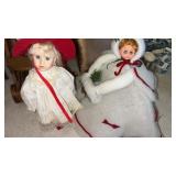 2 plastic dolls  approximately  16" tall