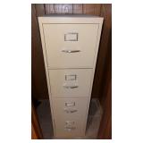 4 door metal file cabinet  in basement buyer must