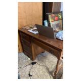 Wooden desk  42 x 30 x 19.6" in basement buyer
