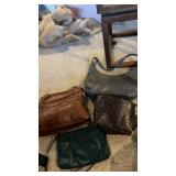 3  great condition purses and 1 makeup bag