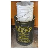 Buckets and old military metal container drinking