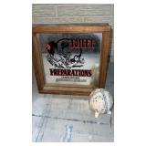 Wood framed mirror with advertisement and more