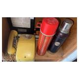 Land line hanging phone and 2 thermoses