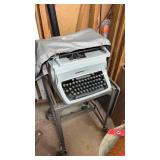 Underwood typewriter and stand on wheels. In