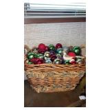 Large basket with glass Christmas ornaments  and
