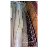 2 area rugs. Might be some staining.  In basement