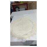 Round tablecloth. Made out of feed sacks