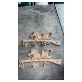 Cast iron was hooks with horse and hat
