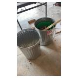 Metal trash cans and rope