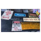 8 metal and plastic signs
