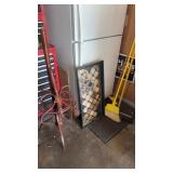 Brooms, hat rack that needs repair to the top and