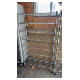 Metal shelving unit on wheels
