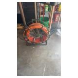Large industrial size metal extension cord roller