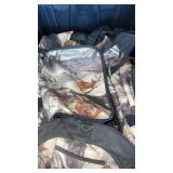 Camo duffle bag and rubber over shoes