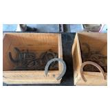 Real horse shoes  in wooden boxes