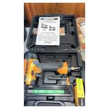 Bostitch nail gun in plastic box