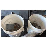 2 buckets with scrap iron and nuts and bolts