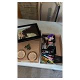 Picture of a bull , ceramic frog , pens,