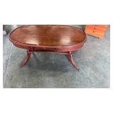 Wooden oval, coffee table, approximately 37.5 x