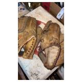 2 baseball gloves