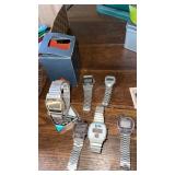 6 miscellaneous menï¿½s watches with stretch bands.