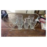 Metal drinking glass holder and glasses