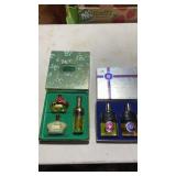 2 vintage sets of perfumes