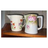 2 decorative pitchers