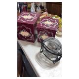 Tin decorated boxes and small desk fan