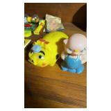 Vintage plastic piggy banks and more