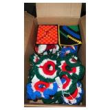 Large box of knitted decorations