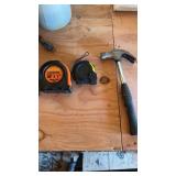 2 tape measure and hammer