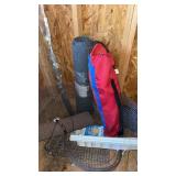 Chicken wire , outdoor rug and lawn chair in a