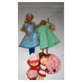 2 vintage Barbieï¿½s and 2 strawberry shortcake
