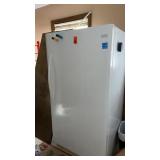 Frigidaire upright freezer  approximately  34 x