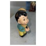 Plastic kissing boy figure