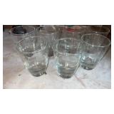 7 juice glasses with decorative etching on the
