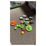 Lot of vintage fish price little people, merry go