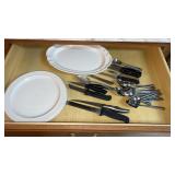 Drawer of utensils, platter and 3 plates
