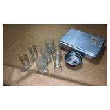 7 drinking glasses , aluminum cake pan with lid