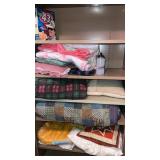 Lot of blankets and more  cabinet not included